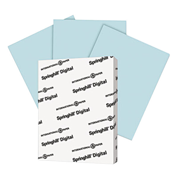 A package of Springhill blue vellum bristol cover paper with a stack of papers on top.