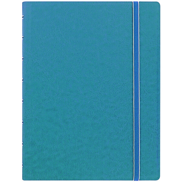 A blue notebook with a white stripe on the cover.