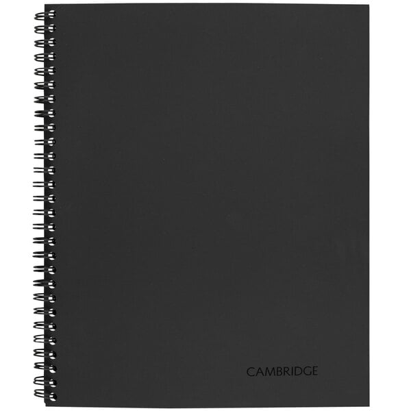 A black Cambridge spiral notebook with legal rule paper.