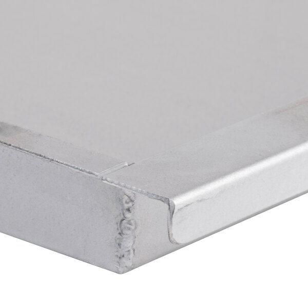 A silver metal grease tray for an Avantco charbroiler.
