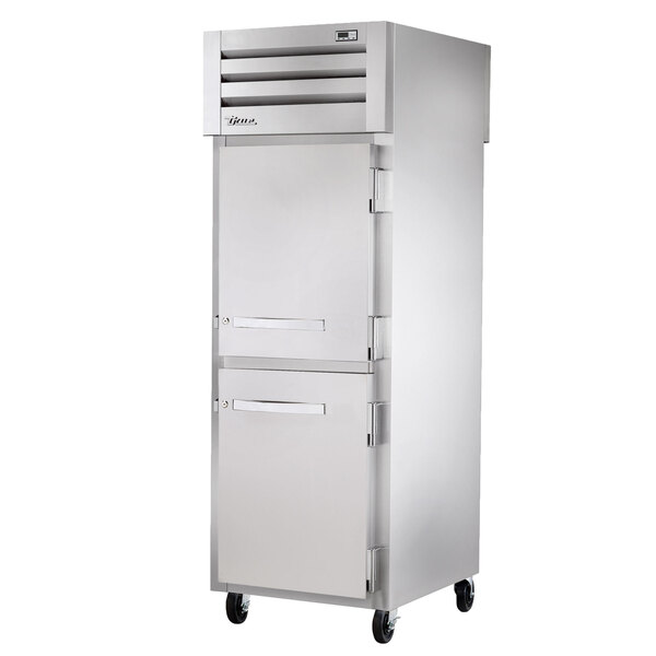A True Spec Series silver reach-in refrigerator with two half doors.