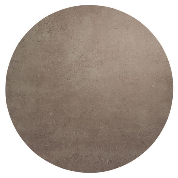 A BFM Seating round concrete table with a brown surface.