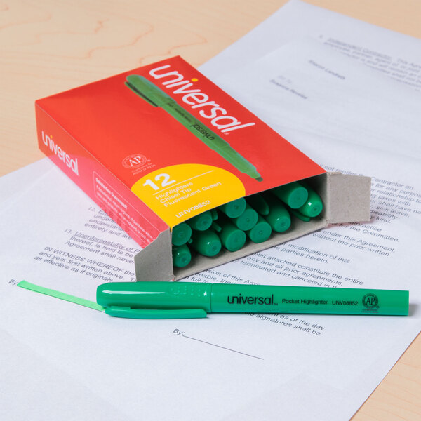 A box of Universal fluorescent green highlighters with a green pen on top.