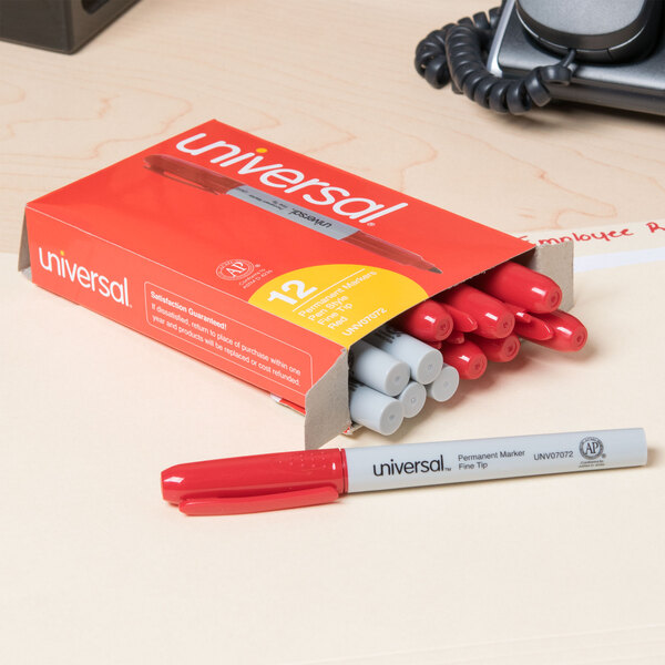 A box of Universal red bullet tip permanent markers.