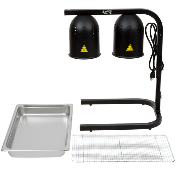 A black Avantco heat lamp on a countertop with a pan and a grate.