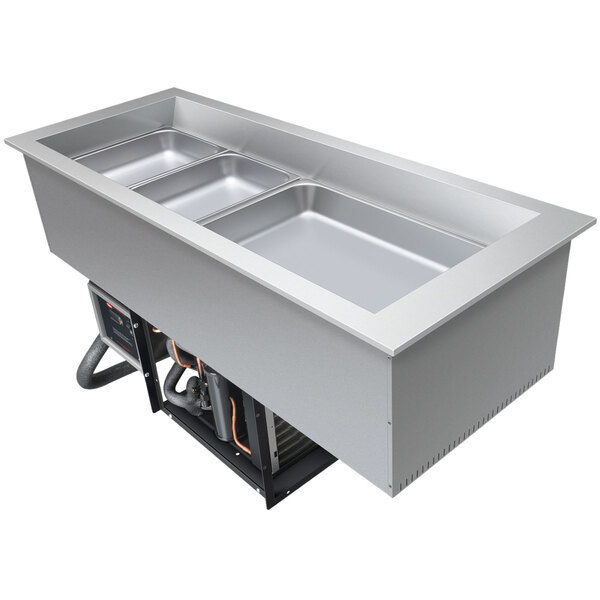 A Hatco drop-in cold food well with two compartments in a counter.