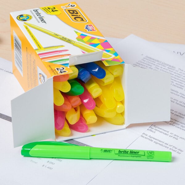 A box of Bic Brite Liner highlighters on a table.