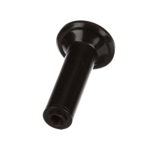 A close-up of a black plastic knob with a nut on it.