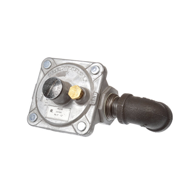 A close-up of a Blodgett Regulator Assy with a brass knob on a metal valve.