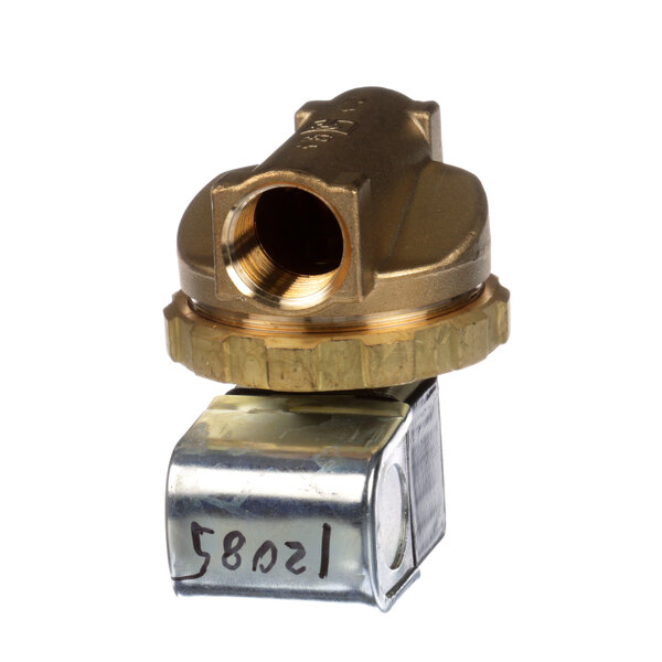 A close-up of a Blakeslee brass valve stem with a metal cap.
