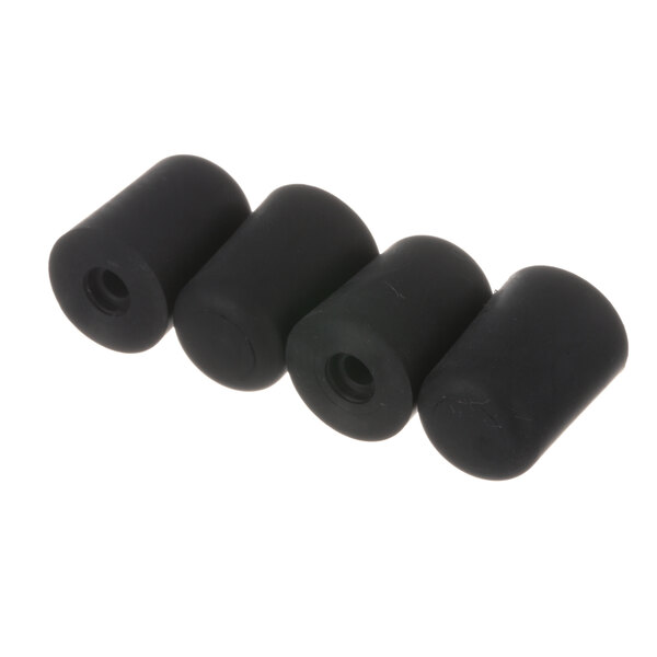 A row of black rubber plugs.