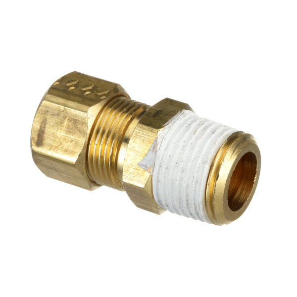 A close-up of a Montague brass threaded male connector with white threading.