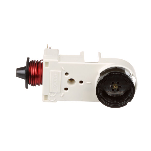 A white plastic Delfield relay with red wires.