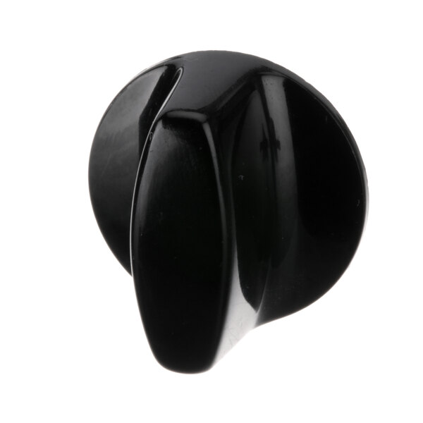 A close-up of a black knob.