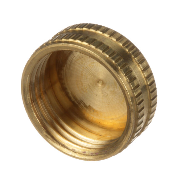 A close-up of a brass Cleveland hose nut cap.