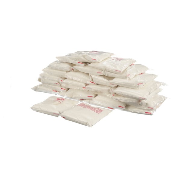 A stack of Keating Acidox Powder white bags.