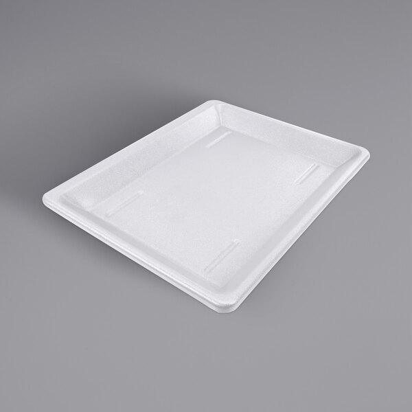 A white plastic tray with a lid on it.