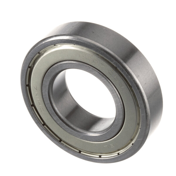 A close-up of a Blakeslee steel ball bearing with a steel ring.