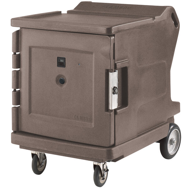 A large brown Cambro hot food holding cabinet on wheels.