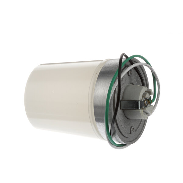 A white cylinder with green wires.