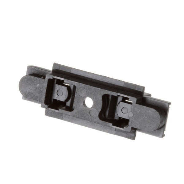 A black plastic Hatco fuse block with two holes.
