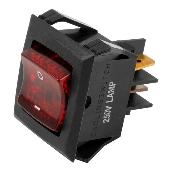 A black Blodgett main switch with a red light.