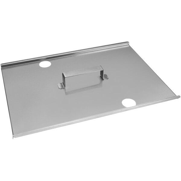 A stainless steel metal plate with a handle and a hole in the middle.