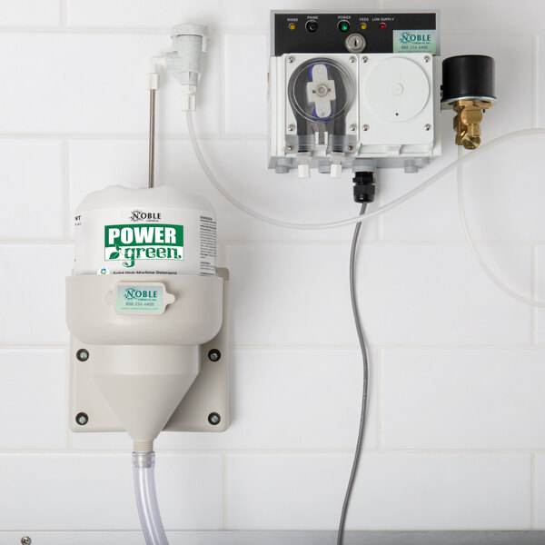 A white container of Noble Chemical Power Green Concentrated Solid Dish Machine Detergent with a green label.