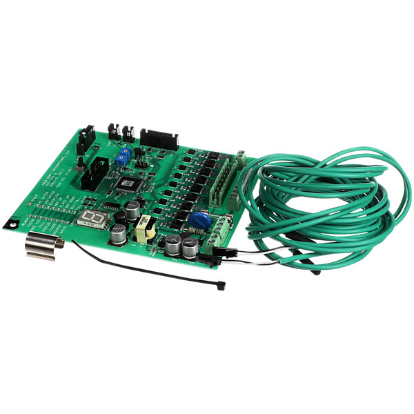 A green Kold-Draft Pcb controller with wires attached.