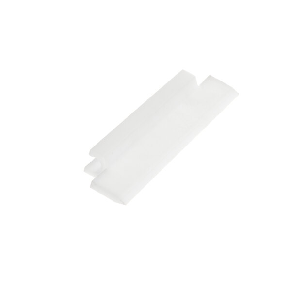 A white plastic SaniServ Scraper Blade.