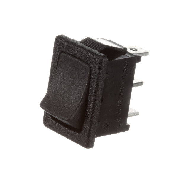 A close-up of a black Ovention push button switch with a black plastic cover.