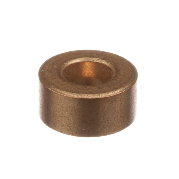 A close-up of a bronze metal cylinder.