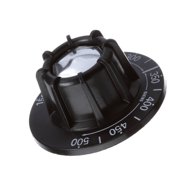A black plastic Montague 1024-3 knob with white numbers.