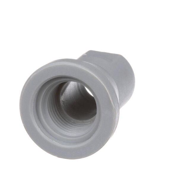 A close-up of a grey plastic pipe fitting.