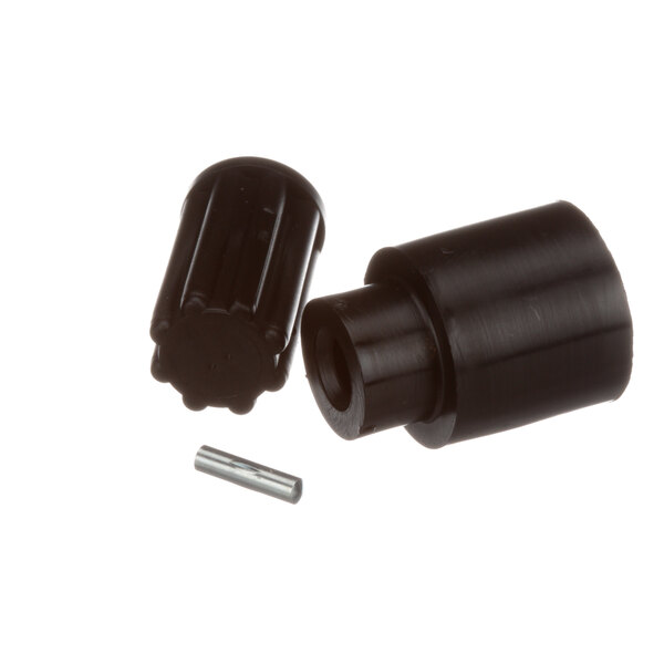 A close-up of a black plastic Electrolux Professional coupler set.