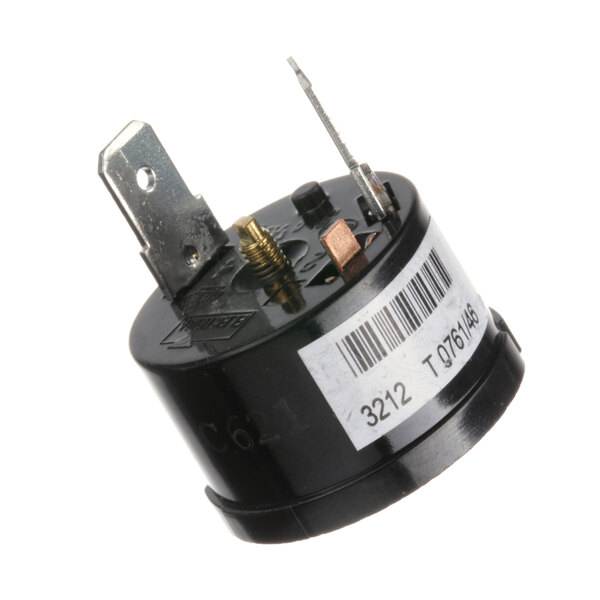 A close-up of a small round black True Refrigeration Overload Relay device.