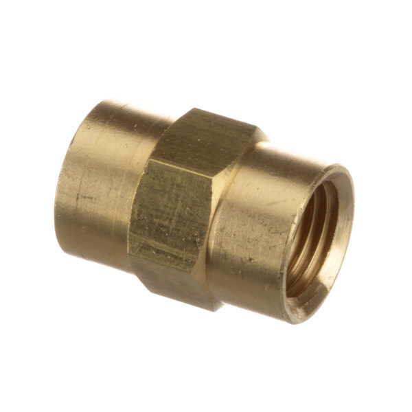 A close-up of a brass threaded female fitting with a metal object.