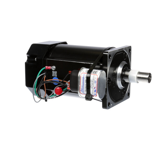 A black electric motor with wires and a round shaft.