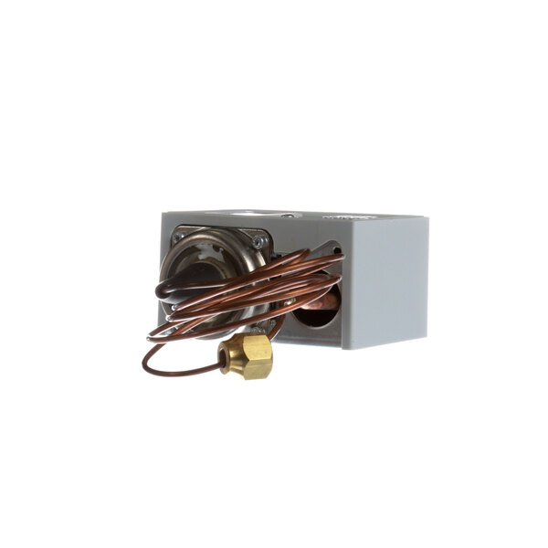 A grey metal box with copper wires and a copper wire.