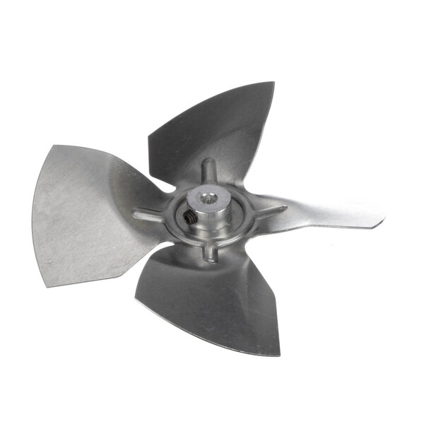 A close-up of a metal Traulsen fan blade with a nut.