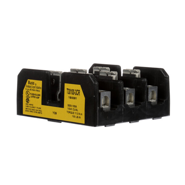 A Champion black and yellow fuse block with three circuit breakers inside.