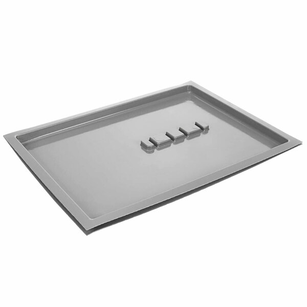 A grey rectangular Delfield condensate pan with holes and a handle.
