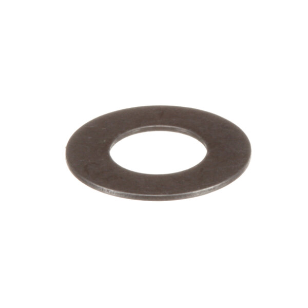 A close-up of a metal ring with a black center.