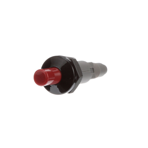 A close-up of a black and red spark plug with a plastic connector.