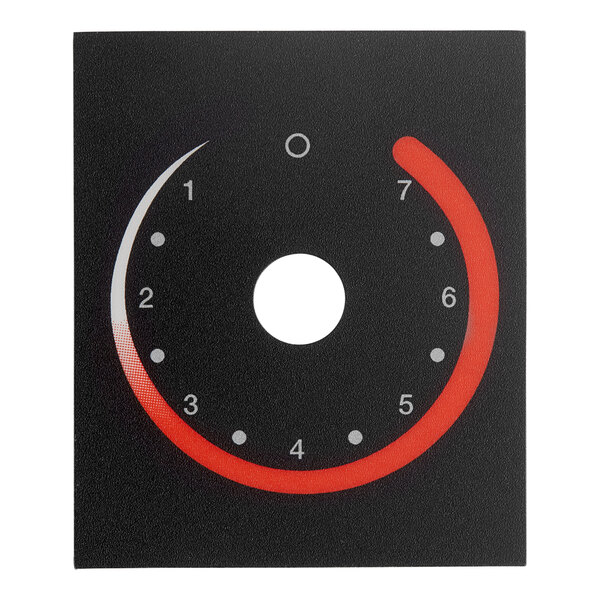 A black and red circular dial with white circles and a circle.