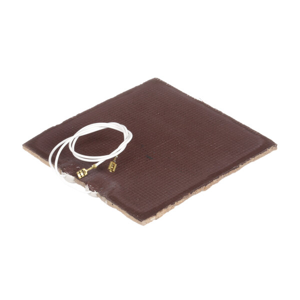 A square brown Wells toaster element with a white wire.