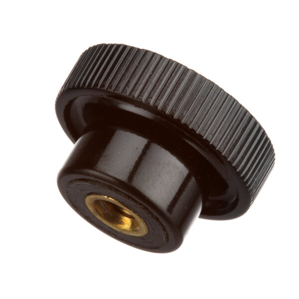 A black plastic Nieco knob with a gold center wheel.
