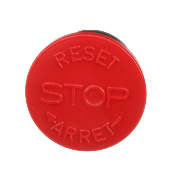 An old style red Varimixer stop button with white text.