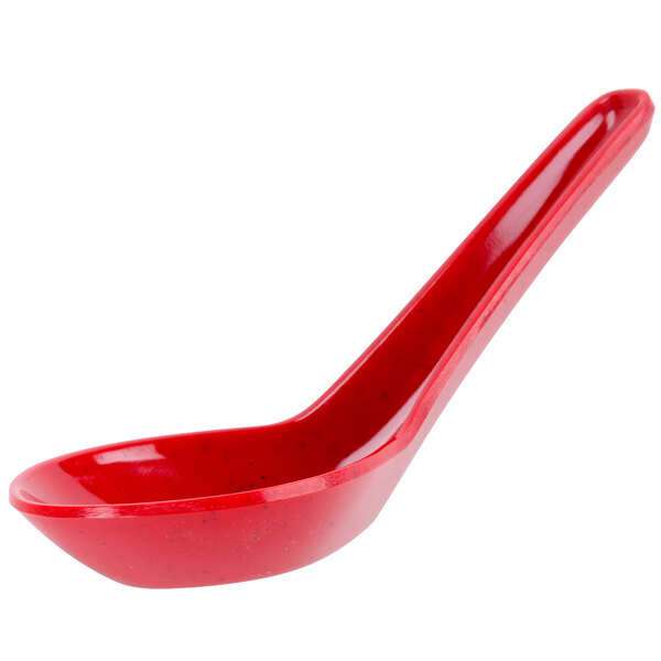 A red melamine soup spoon with a long handle.