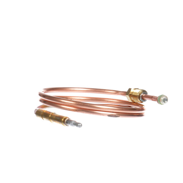 A close-up of a copper tube with a gold connector.